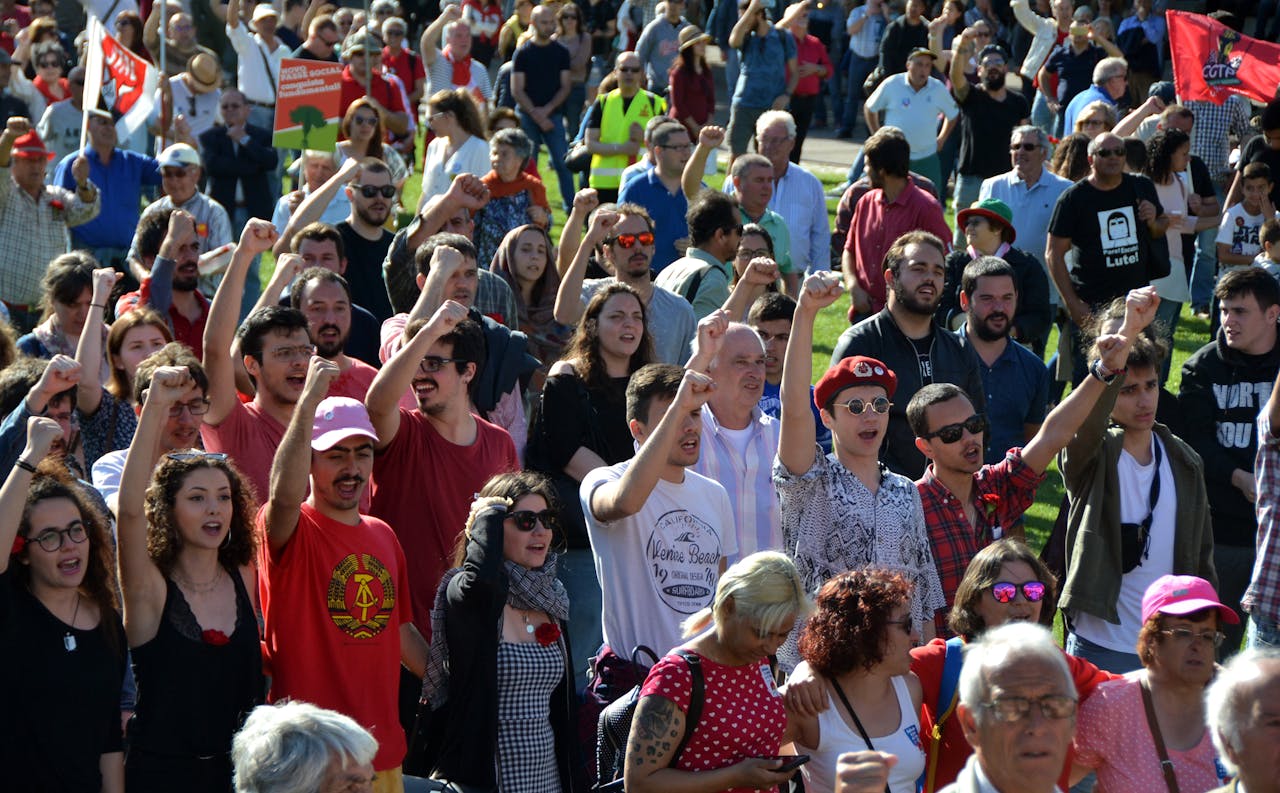 A large group of people gathered in Lisbon for a political demonstration.
